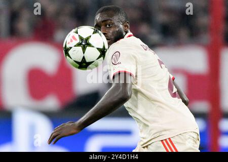 Munich, Germany. 17th Sep, 2024. Soccer, Champions League, FC Bayern Munich - Dinamo Zagreb, Preliminary round, Matchday 1, Allianz Arena, Munich's Dayot Upamecano looks at the ball. Credit: Peter Kneffel/dpa/Alamy Live News Stock Photo