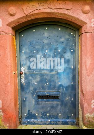 Old weathered metal door. Stock Photo