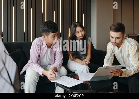 Collaborating on Business Project in Modern Office Stock Photo