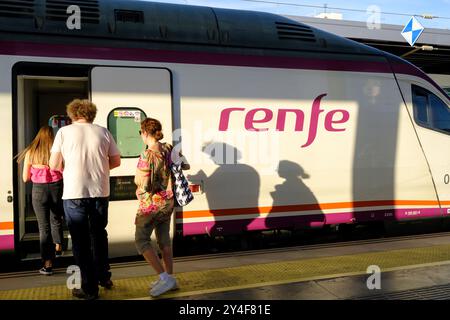 Spain, Andalusia, Granada: the station. Passengers boarding a Renfe train. Stock Photo