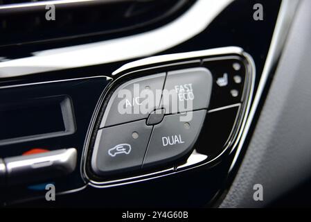 Buttons for activating the air conditioners on the dashboard passenger car Stock Photo