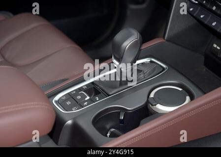 Modern automatic transmission lever on the passenger car console Stock Photo