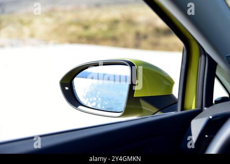 Car detail. Side mirror with turn signal of a luxury car from inside Stock Photo