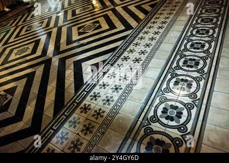 Some of the ornate and distinctive tiling on the floor of the Metropolitan Cathedral of Santiago (Catedral Metropolitana de Santiago) in the heart of Stock Photo