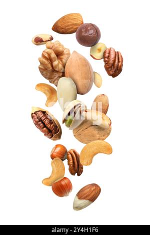 Pecan and other nuts in air on white background Stock Photo