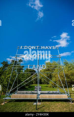 London, UK. 18th Sep, 2024. Nathan Coley, ‘I Don't Have Another Land', 2022 - Visitors enjoy the sunny weather and get a first chance to look around Frieze Sculpture, one of the largest outdoor exhibitions in London, including work by international artists in Regent's Park and running from 18 September through to 27 October 2024. Credit: Guy Bell/Alamy Live News Stock Photo