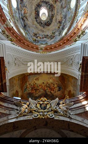 Upward view of the grand ceiling inside Karlskirche (St. Charles Church), a city landmark on the Karlsplatz square in Vienna. Stock Photo