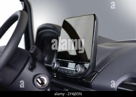 Screen multimedia system on dashboard in a modern car Stock Photo