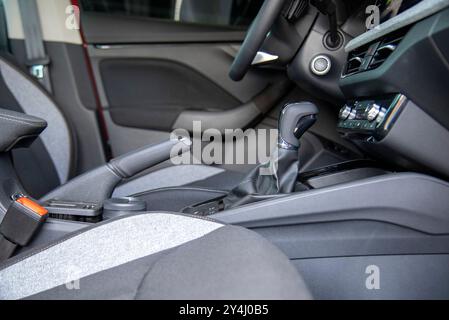 Manual gear shift and handbrake inside the passenger car Stock Photo