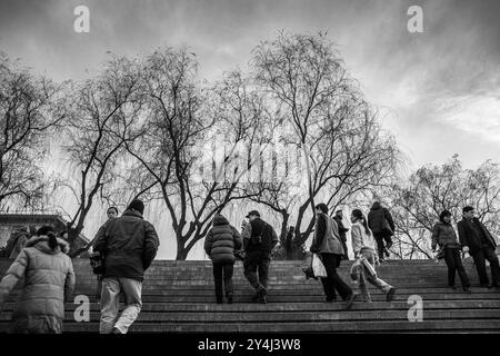 People walking upstairs coming out from the subway station, Beijing, China Stock Photo