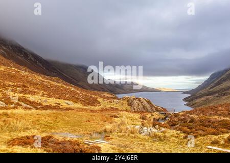Llyn Cowlyd Reservoir which lies in the heart of the Carneddau mountain range. This body of water is part of a Hydro electric scheme. Built origanally Stock Photo