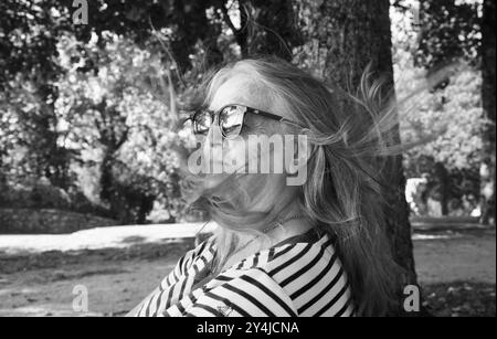 A pretty lady, in the grounds of the chateau. Stock Photo