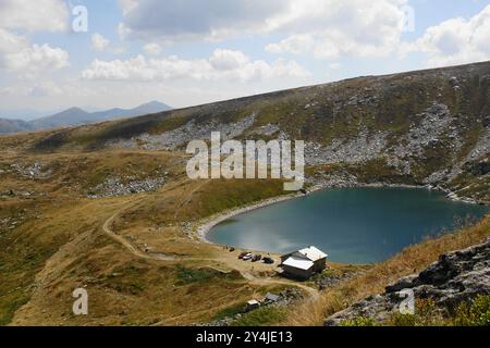 Big Lake (Golemo Ezero) with Dimitar Ilievski-Murato Mountain Hut on Baba Mountain in the Pelister National Park in North Macedonia Stock Photo