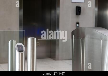 Security gate with card reader for office building access control system Stock Photo