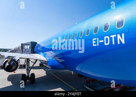 Blue colored ITA Airways Airbus A320 EI-DTN at Hamburg Airport Stock Photo