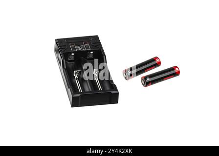 A black, dual-slot battery charger with two red and black 18650 rechargeable batteries. The charger features a sleek, modern design and is isolated on Stock Photo