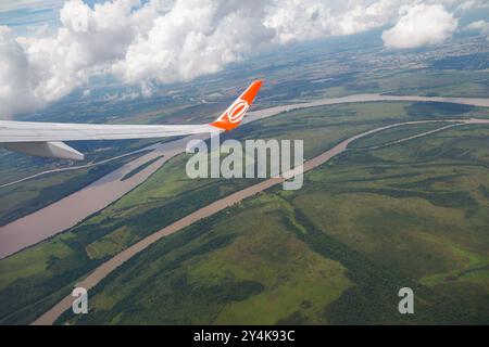 GOL airplane wing and the Jacui, Gravatai and Guaiba rivers (lake) and the islands in Porto Alegre, Rio Grande do Sul, Brazil. Stock Photo