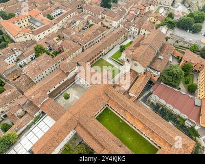 Aerial view of San Salvatore basilica, Roman amphitheater in medieval Brescia historic town center in Italy Stock Photo