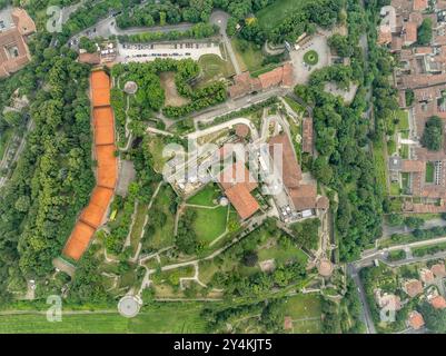 Aerial top down ground plan view of Brescia castle in Italy with battlements, a tower, drawbridge & ramparts, angled bastions plus an arms museum in t Stock Photo