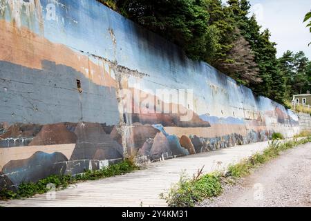 Mural of the Holyrood Beach and Boardwalk on a concrete retaining wall in Holyrood, Newfoundland & Labrador, Canada Stock Photo