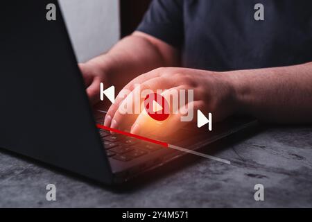 Woman watching a live stream. Online stream window interface. Video streaming on internet concept. Multimedia player on digital tablet. Stock Photo