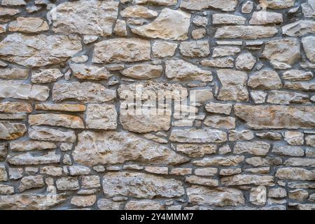 Stonework structure. Stone fence. Stone background texture. High quality photo Stock Photo