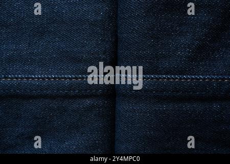 Dark blue denim jeans texture background with cross lines Stock Photo