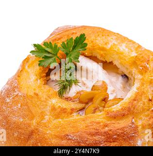 cream soup in bread isolated on white Stock Photo