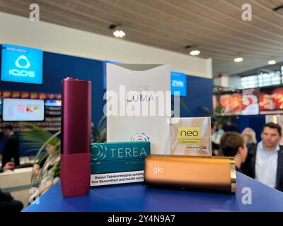 Dortmund, Germany. 19th Sep, 2024. An Iqos brand tobacco heater (left) from  Philip Morris stands next to a Glo brand tobacco heater from British  American Tobacco (BAT) on a shelf at the