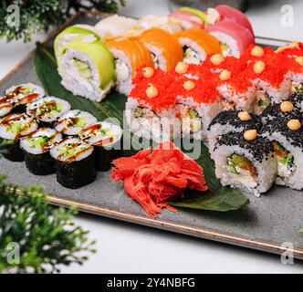 Fresh sushi traditional japanese food on big plate Stock Photo