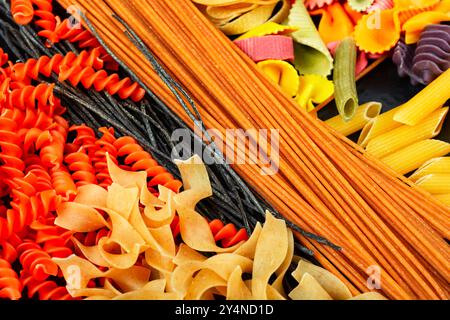Set of dry macaroni, uncooked pasta and spaghetti. World pasta day. Close up Stock Photo