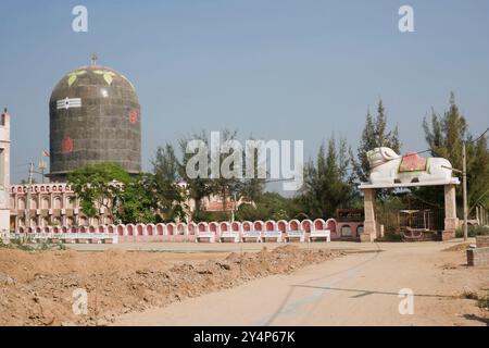 Khambhat, Gujarat / India - January 11, 2017 : A statue of the white bull and the Shivling near the temple of the goddess Shree Sikotar Mata in the vi Stock Photo