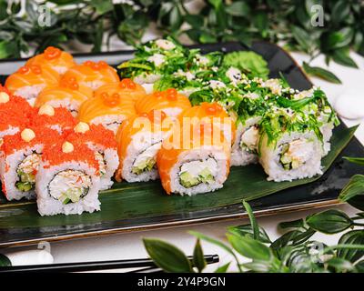 Big set of rolls with wasabi and pickled ginger Stock Photo