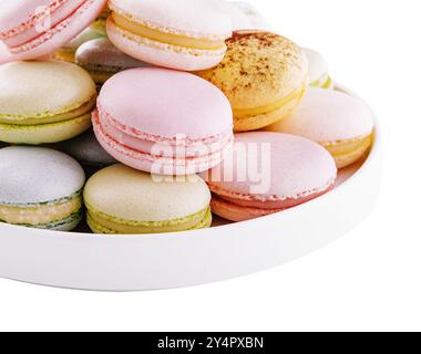 Multicolored macaroons on ceramic plate isolated on white Stock Photo