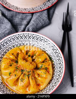 dumplings Khinkali on a plate in restaurant Stock Photo