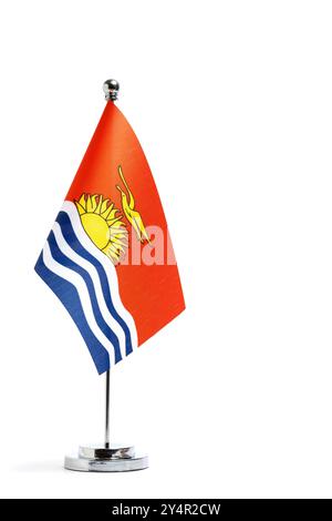 Table national flag Kiribati on metal flagpole on white background Stock Photo