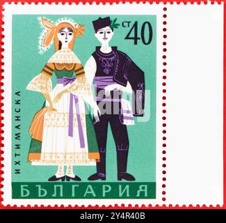 Photo of a 40 Bulgarian stotinka postage stamp Man and Woman from Ihtiman from the 1968 folk costumes series Stock Photo