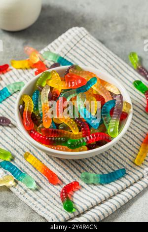 Sweet Sugary Gummy Worms for Halloween in a Bowl Stock Photo