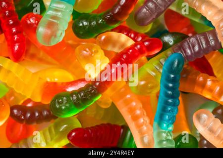 Sweet Sugary Gummy Worms for Halloween in a Bowl Stock Photo