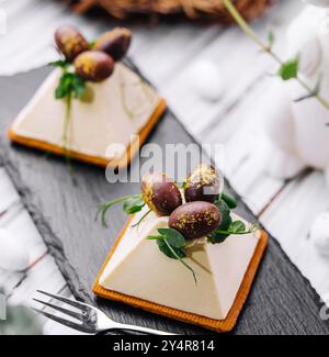 dessert souffle cookies with chocolate Easter eggs Stock Photo