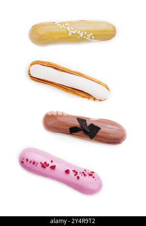 different types of eclairs with different glazes isolated on white background Stock Photo