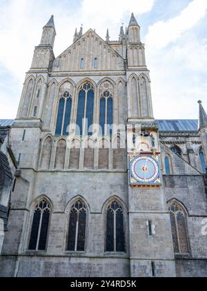 September 2024 - External clock on the wall of Wells cathedral, in Somerset, England's Smallest city Stock Photo