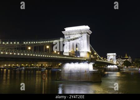 Night view of Szechenyi Chain Bridge across the River Danube connecting Buda and Pest, Budapest, Hungary, Europe Stock Photo