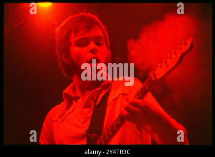 SUPERGRASS, CONCERT, 1997: Gas Coombes of Supergrass playing live at Newport Centre in Newport, Wales, UK with their second album on 10 May 1997. Photograph: Rob Watkins.   INFO: Supergrass, a British rock band, achieved success in the 1990s with their infectious blend of Britpop and punk influences. Hits like 'Alright' and albums such as 'I Should Coco' solidified their reputation for energetic, catchy tunes, contributing to the vibrant music scene of the era. Stock Photo