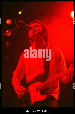 SUPERGRASS, CONCERT, 1997: Gas Coombes of Supergrass playing live at Newport Centre in Newport, Wales, UK with their second album on 10 May 1997. Photograph: Rob Watkins.   INFO: Supergrass, a British rock band, achieved success in the 1990s with their infectious blend of Britpop and punk influences. Hits like 'Alright' and albums such as 'I Should Coco' solidified their reputation for energetic, catchy tunes, contributing to the vibrant music scene of the era. Stock Photo