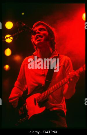 SUPERGRASS, CONCERT, 1997: Gas Coombes of Supergrass playing live at Newport Centre in Newport, Wales, UK with their second album on 10 May 1997. Photograph: Rob Watkins.   INFO: Supergrass, a British rock band, achieved success in the 1990s with their infectious blend of Britpop and punk influences. Hits like 'Alright' and albums such as 'I Should Coco' solidified their reputation for energetic, catchy tunes, contributing to the vibrant music scene of the era. Stock Photo