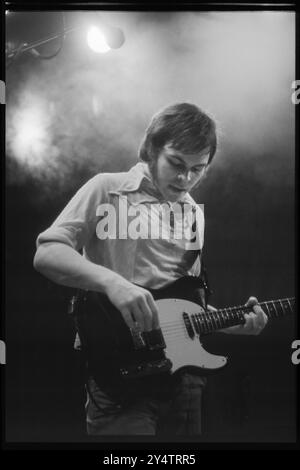 SUPERGRASS, CONCERT, 1997: Gas Coombes of Supergrass playing live at Newport Centre in Newport, Wales, UK with their second album on 10 May 1997. Photograph: Rob Watkins.   INFO: Supergrass, a British rock band, achieved success in the 1990s with their infectious blend of Britpop and punk influences. Hits like 'Alright' and albums such as 'I Should Coco' solidified their reputation for energetic, catchy tunes, contributing to the vibrant music scene of the era. Stock Photo