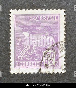 Cancelled postage stamp printed by Brazil, that shows Allegory of Aviation, circa 1922. Stock Photo