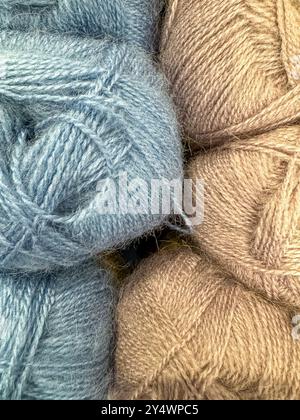 close up grey and beige ball yarn balls . High quality photo Stock Photo