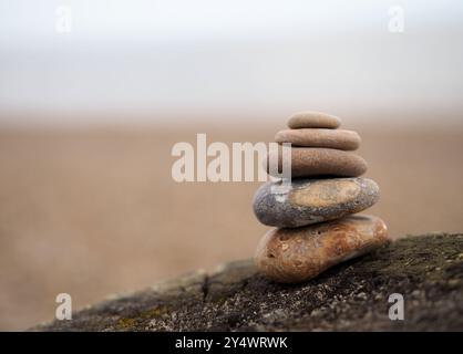 Abstract stack of pebbles, Suffolk, UK Stock Photo